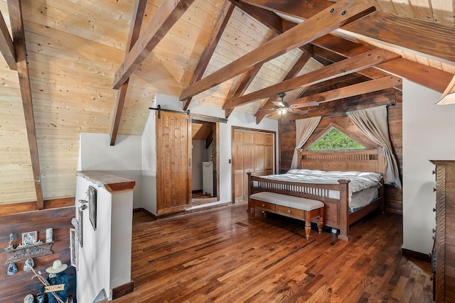 4818 Ensor Hollow Rd, Buffalo Valley, TN 38548 - bedroom featuring a barn door, wood finished floors, and vaulted ceiling with beams