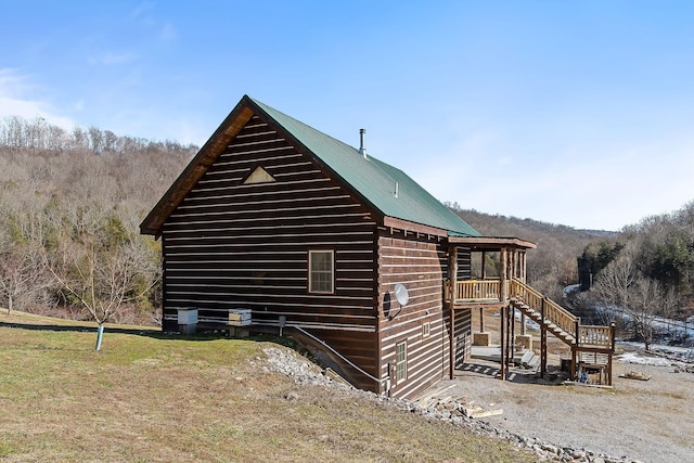 4818 Ensor Hollow Rd, Buffalo Valley, TN 38548 - view of home's exterior with stairway and a yard