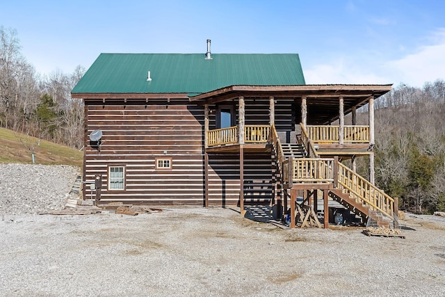 4818 Ensor Hollow Rd, Buffalo Valley, TN 38548 - back of property with stairway and metal roof