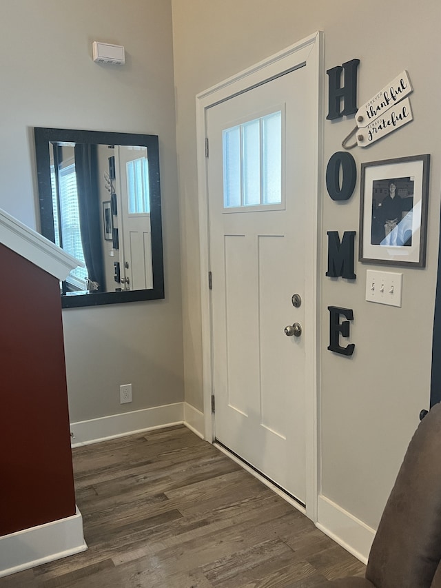 entrance foyer with dark hardwood / wood-style flooring