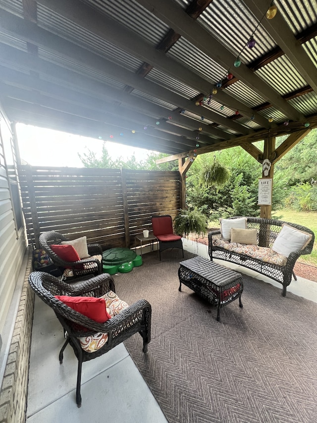 view of patio with a pergola and outdoor lounge area