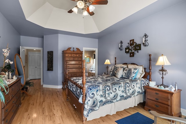 bedroom featuring light hardwood / wood-style flooring and ceiling fan