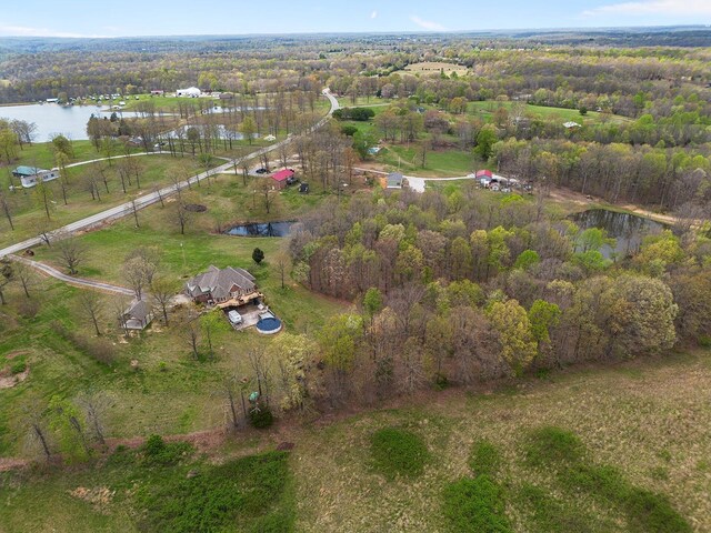 drone / aerial view with a water view and a rural view