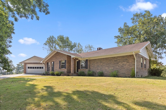 single story home with a garage and a front yard