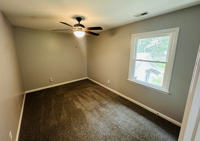 carpeted empty room with ceiling fan