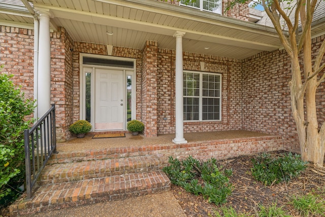 doorway to property with covered porch