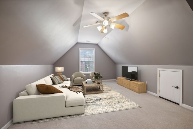 living room featuring ceiling fan, light carpet, and vaulted ceiling