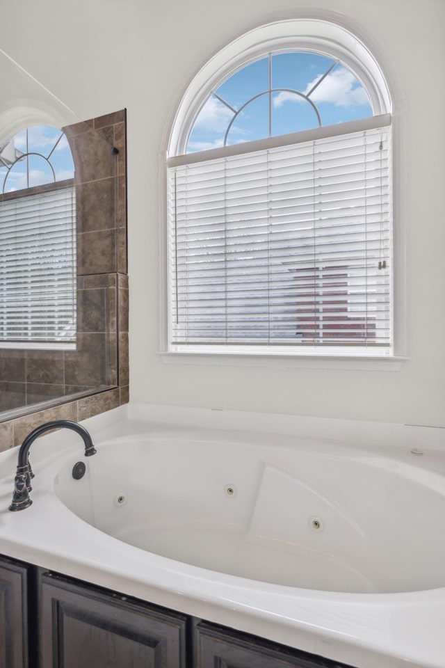 bathroom with a washtub