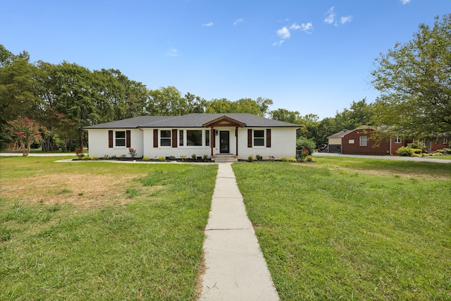 ranch-style house with a front yard