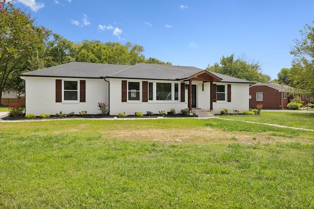 ranch-style house with a front yard