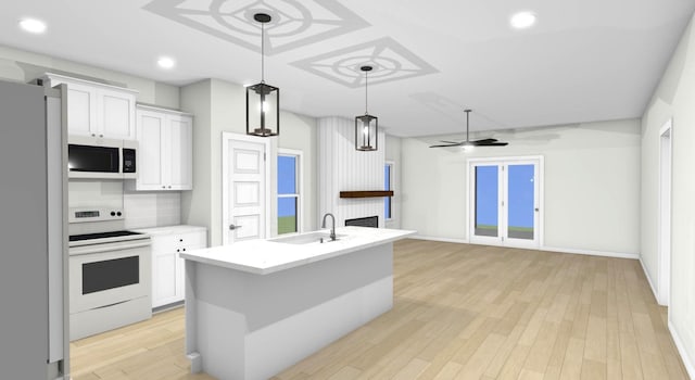 36 Hilltop Rdg, Clarksville, TN 37040 - kitchen featuring light countertops, white appliances, a sink, and white cabinets