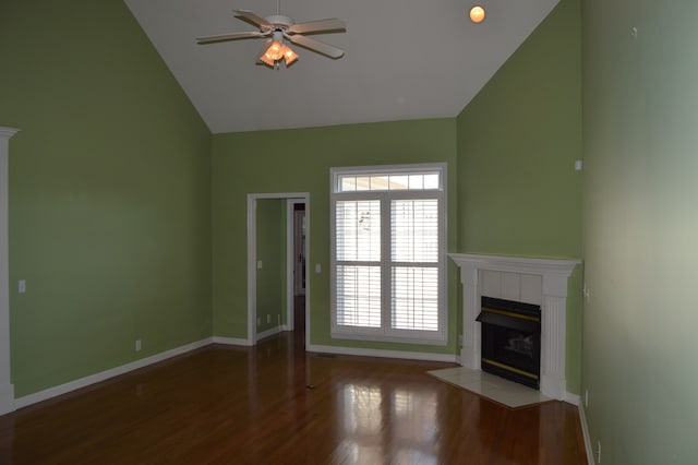 unfurnished living room featuring a fireplace, vaulted ceiling, hardwood / wood-style floors, and ceiling fan