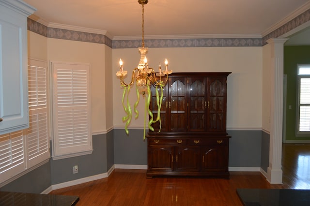 interior space featuring crown molding, dark hardwood / wood-style floors, and a notable chandelier