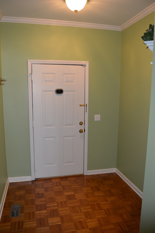 entryway featuring ornamental molding and dark parquet floors