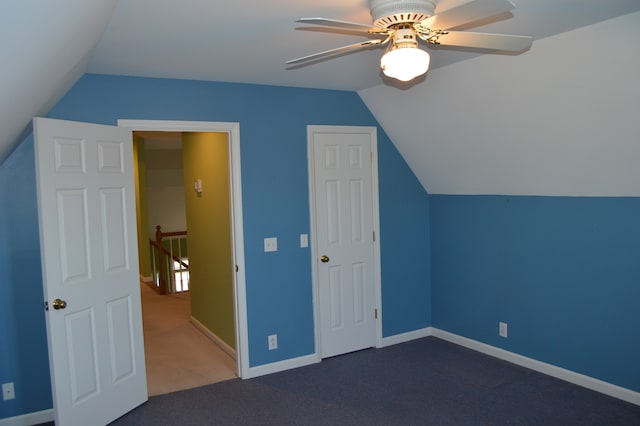 bonus room featuring lofted ceiling, ceiling fan, and carpet flooring