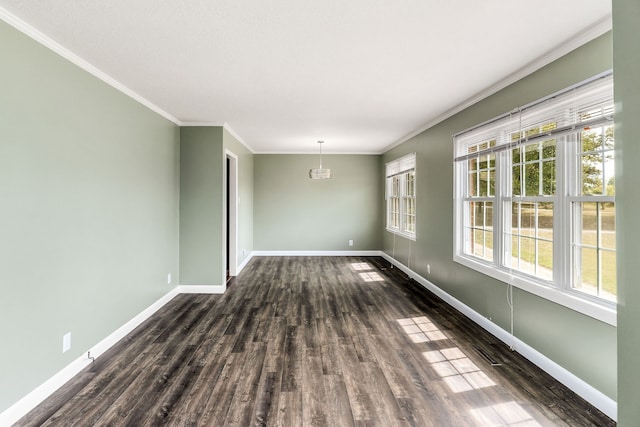 unfurnished room featuring crown molding and dark hardwood / wood-style flooring