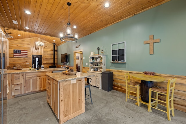 kitchen with pendant lighting, a chandelier, light brown cabinetry, light stone countertops, and wooden ceiling