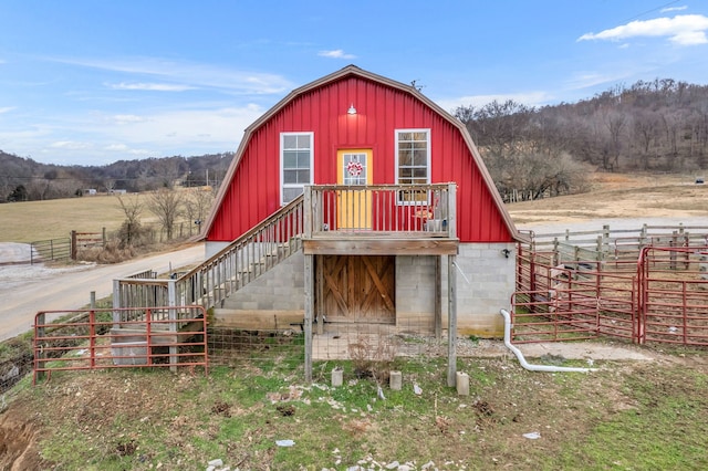 view of outbuilding with a rural view