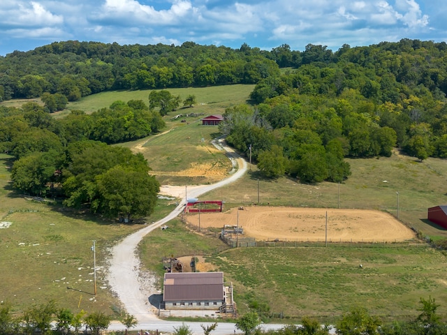 birds eye view of property featuring a rural view