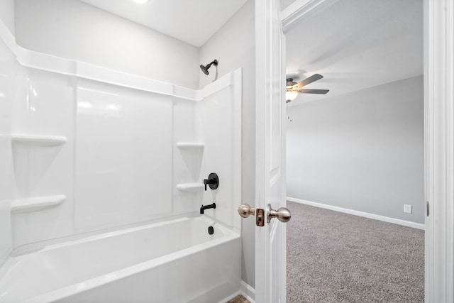 bathroom with ceiling fan and shower / washtub combination