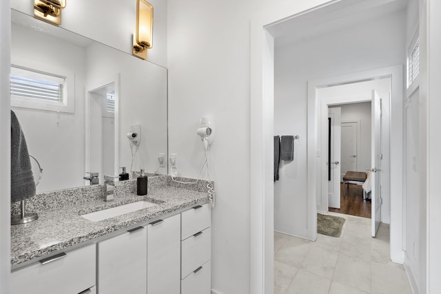 bathroom featuring vanity and wood-type flooring