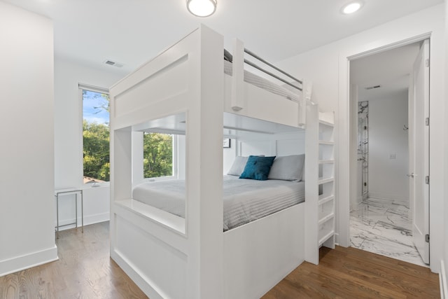 bedroom featuring hardwood / wood-style flooring