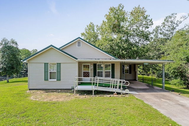 view of front of property featuring a carport, covered porch, and a front yard