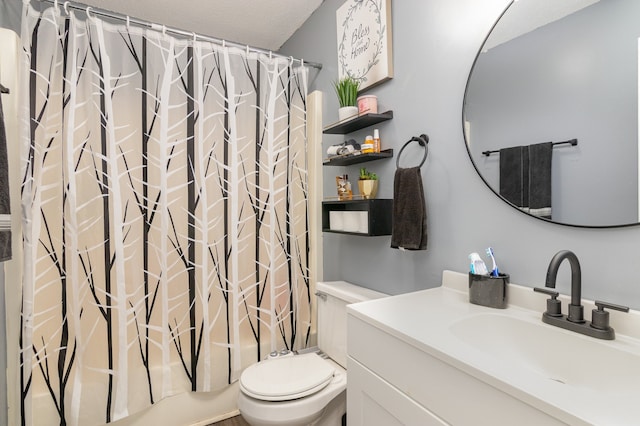 full bathroom with vanity, toilet, shower / tub combo, and a textured ceiling