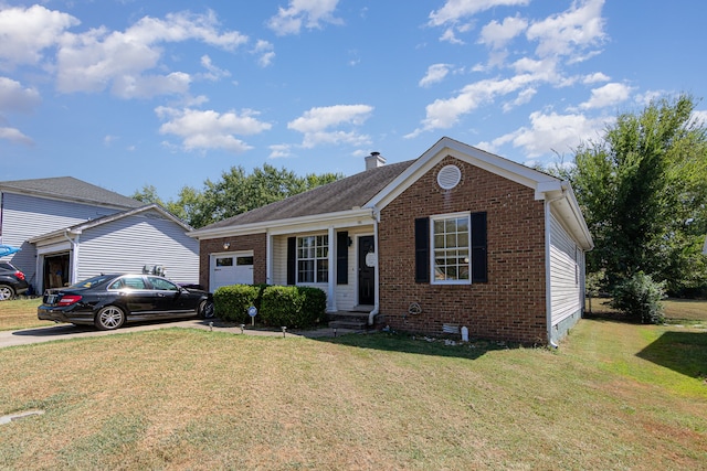 view of front facade with a front lawn and a garage