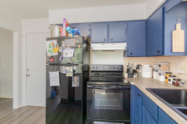 kitchen featuring blue cabinetry, light wood-type flooring, electric range, sink, and black refrigerator