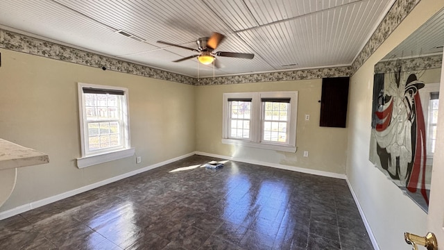 spare room with ceiling fan