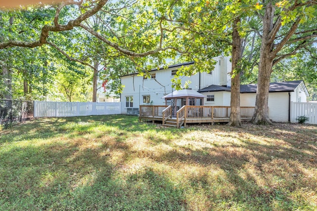 view of yard with a deck