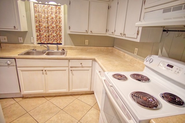 kitchen featuring white appliances, sink, and white cabinets