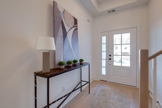 foyer entrance featuring light hardwood / wood-style flooring