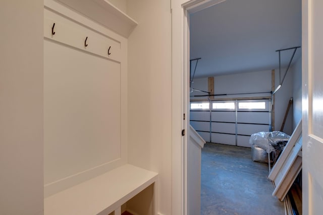 mudroom with concrete floors