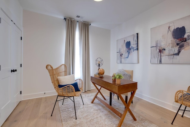 home office with light wood-type flooring