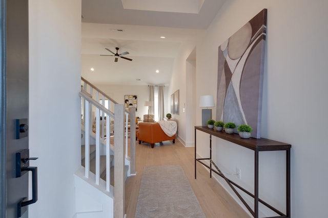 entryway featuring light hardwood / wood-style flooring and ceiling fan