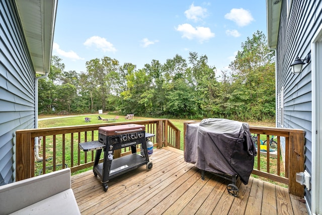 deck featuring a grill