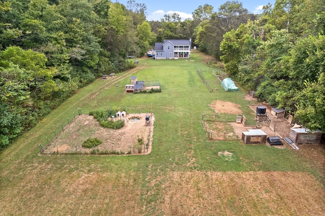 birds eye view of property with a rural view