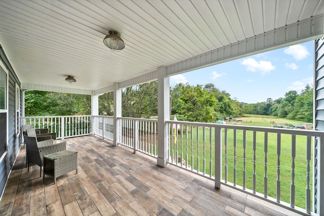 deck featuring a yard