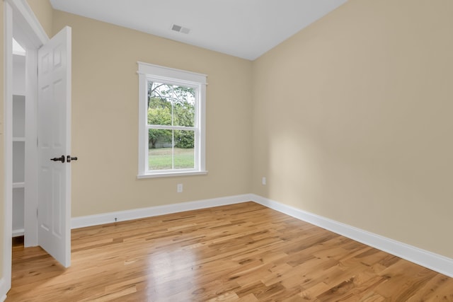 unfurnished room featuring light wood-type flooring