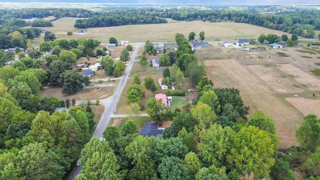 birds eye view of property featuring a rural view