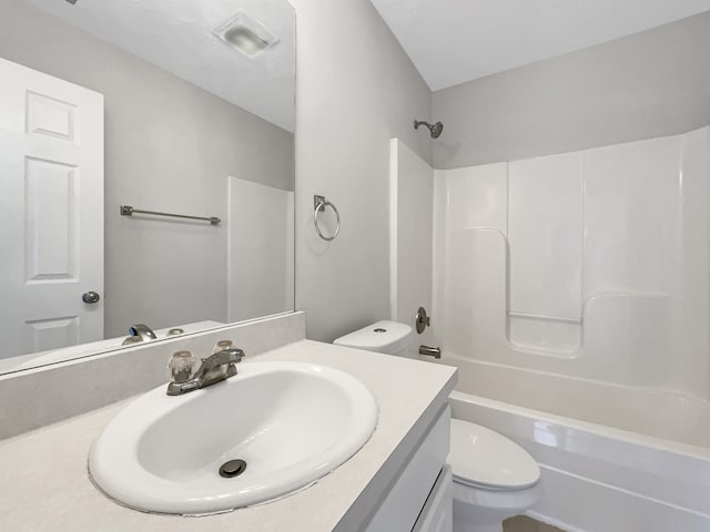 full bathroom featuring vanity, toilet, and bathtub / shower combination