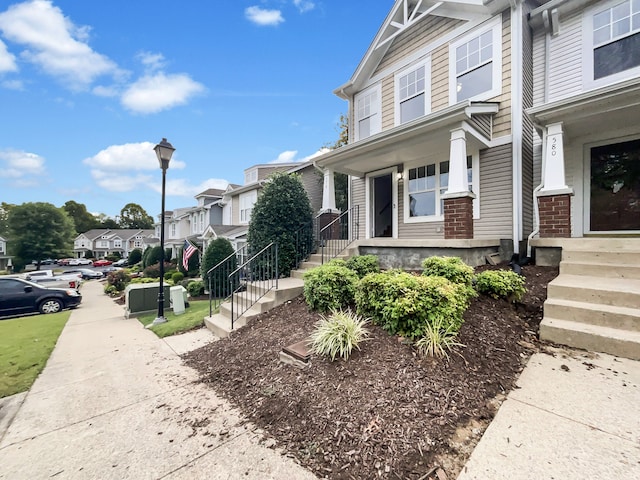 view of front of property featuring covered porch