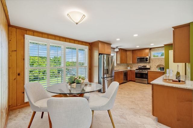 tiled dining area with wooden walls