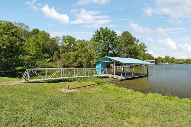 view of dock featuring a water view and a lawn