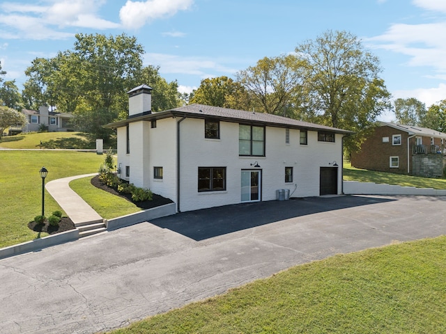 exterior space with a yard