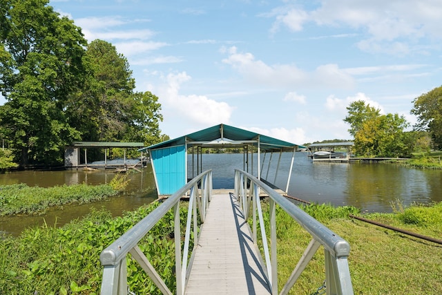 dock area featuring a water view