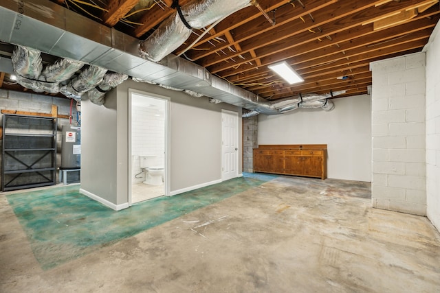 basement featuring water heater