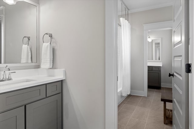 bathroom with tile patterned flooring, vanity, and shower / tub combo with curtain